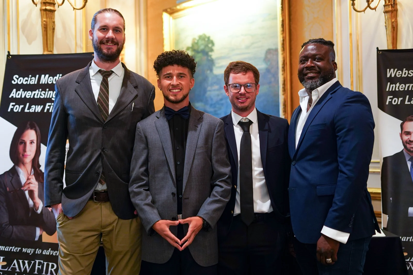 The Law Firm Websites team together at a legal community event.